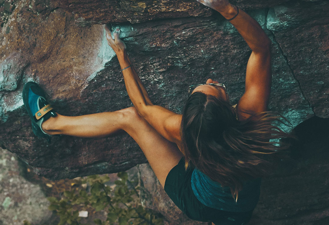 Rock climber bouldering